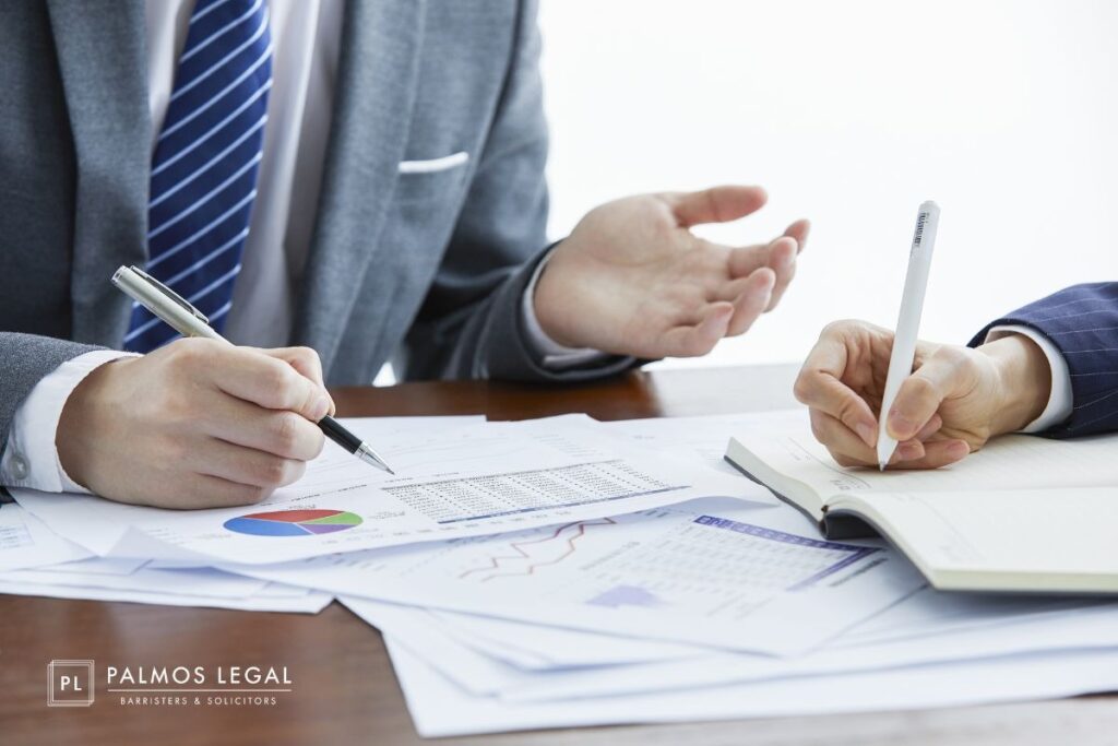 Strategic litigation lawyer discussing out of court dispute resolution